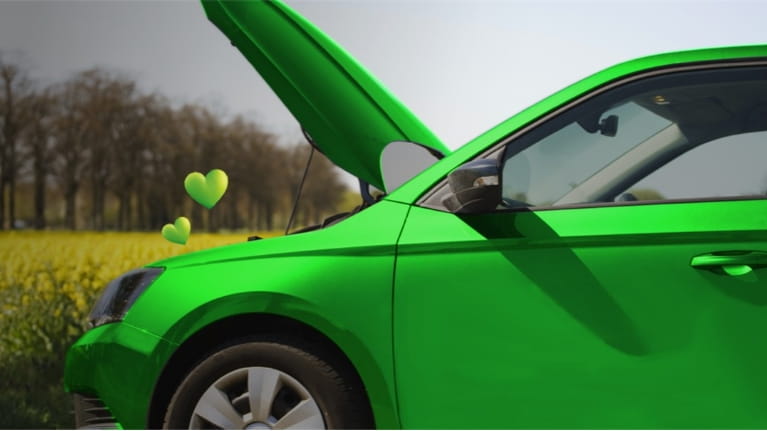 Green car with bonnet open 
